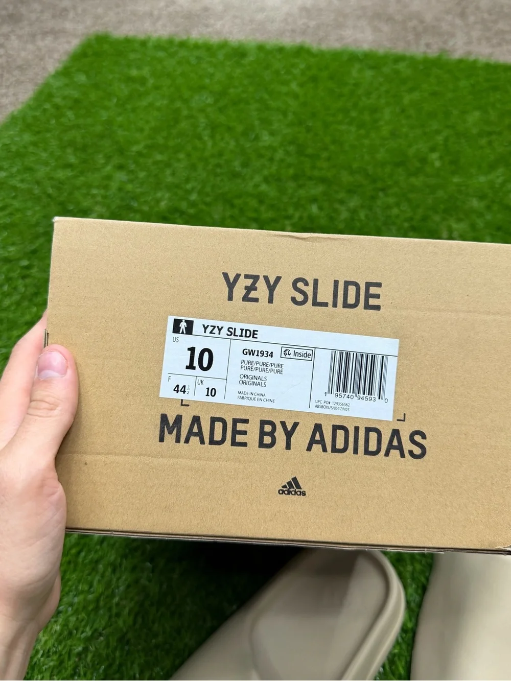 Adidas Yeezy slides “pure” colorway